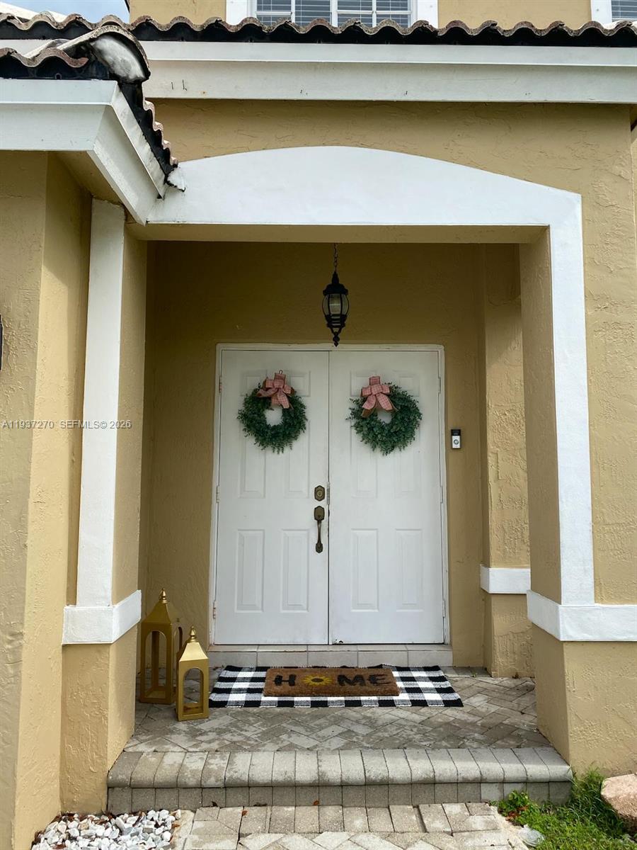 15442 Southwest 139th Street Miami, FL 33196 - Photo 4 of 27 a view of a entryway