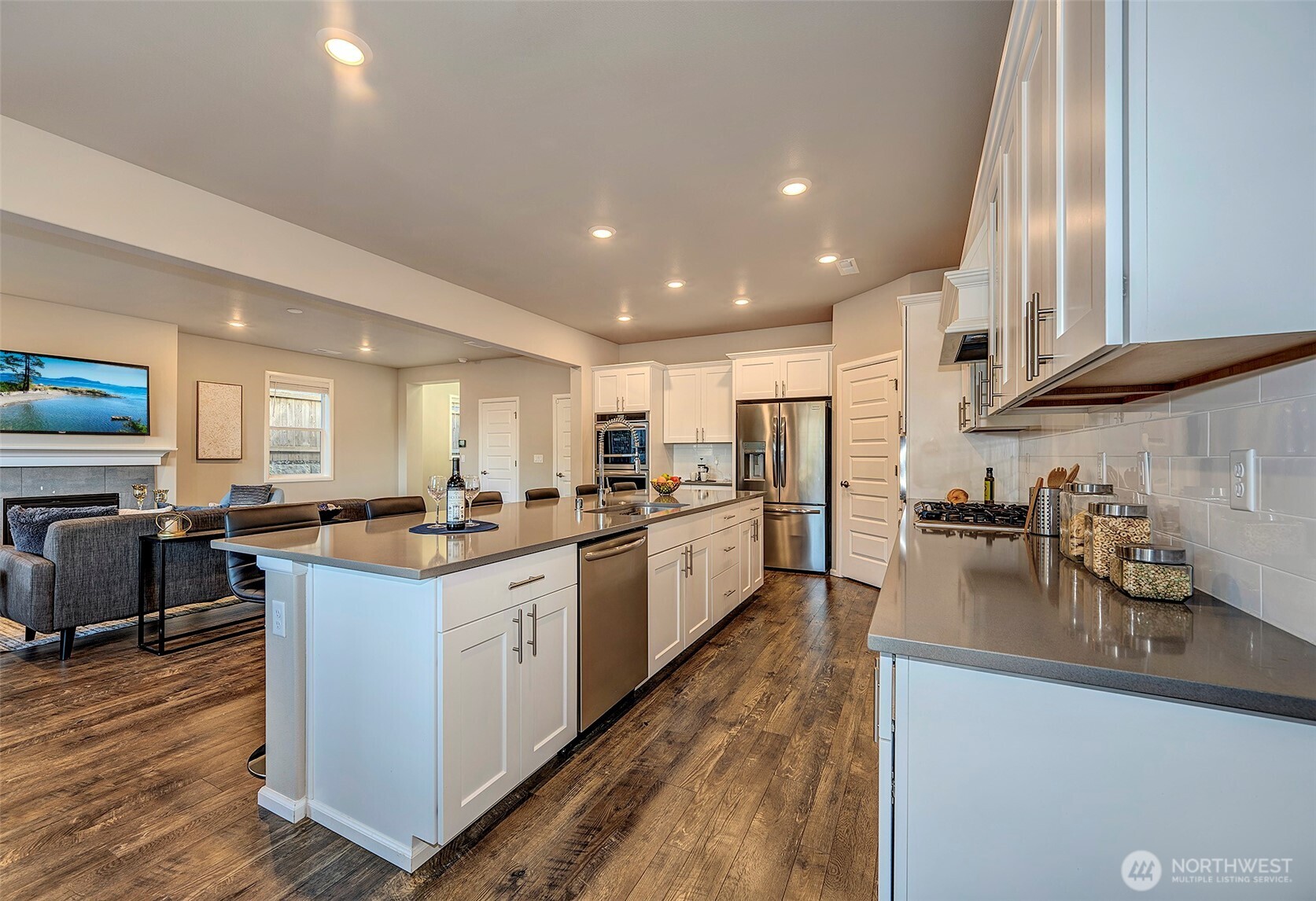 28902 239th Avenue Southeast Maple Valley, WA 98010 - Photo 15 of 36 a kitchen with lots of counter top space and appliances