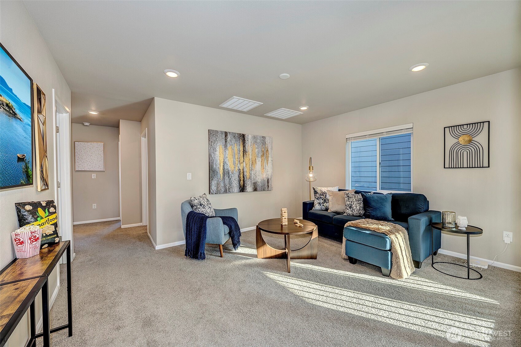 28902 239th Avenue Southeast Maple Valley, WA 98010 - Photo 19 of 36 a living room with furniture and wooden floor