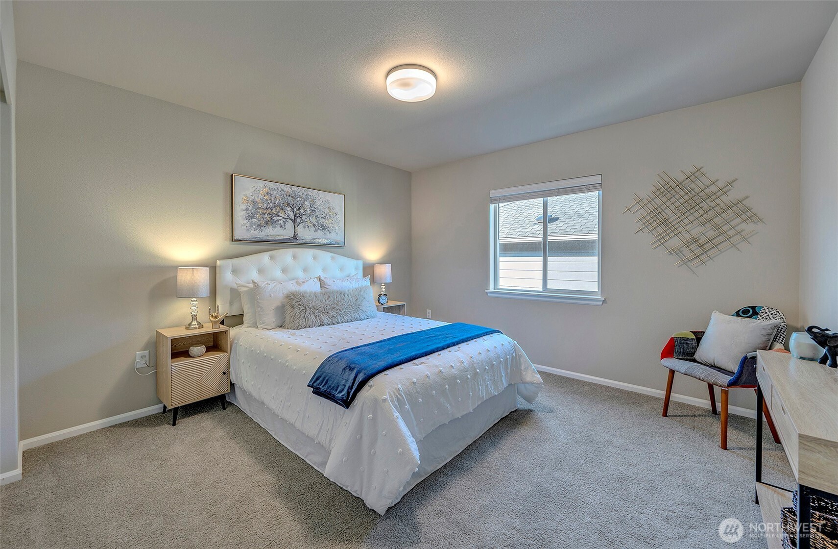 28902 239th Avenue Southeast Maple Valley, WA 98010 - Photo 27 of 36 a bedroom with a bed and a window