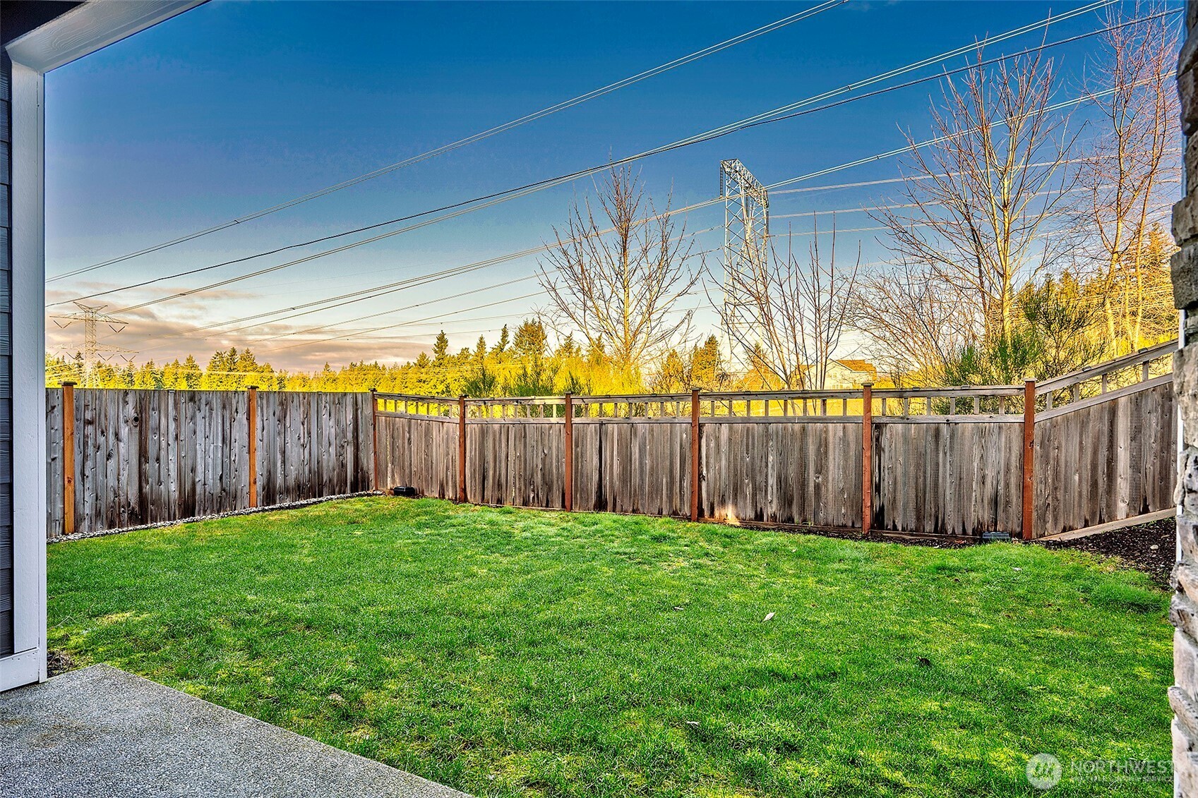 28902 239th Avenue Southeast Maple Valley, WA 98010 - Photo 33 of 36 a view of a backyard with wooden fence