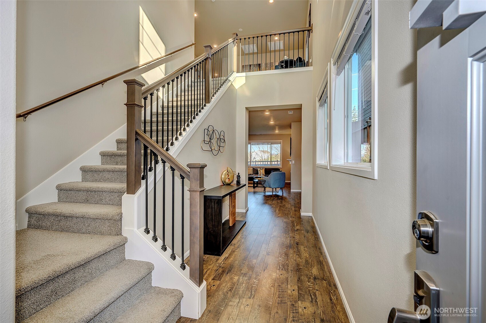 28902 239th Avenue Southeast Maple Valley, WA 98010 - Photo 4 of 36 a view of entryway and hall with wooden floor