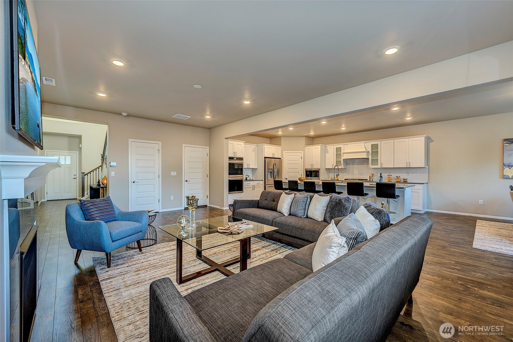 28902 239th Avenue Southeast Maple Valley, WA 98010 - Photo 9 of 36 a living room with furniture and wooden floor
