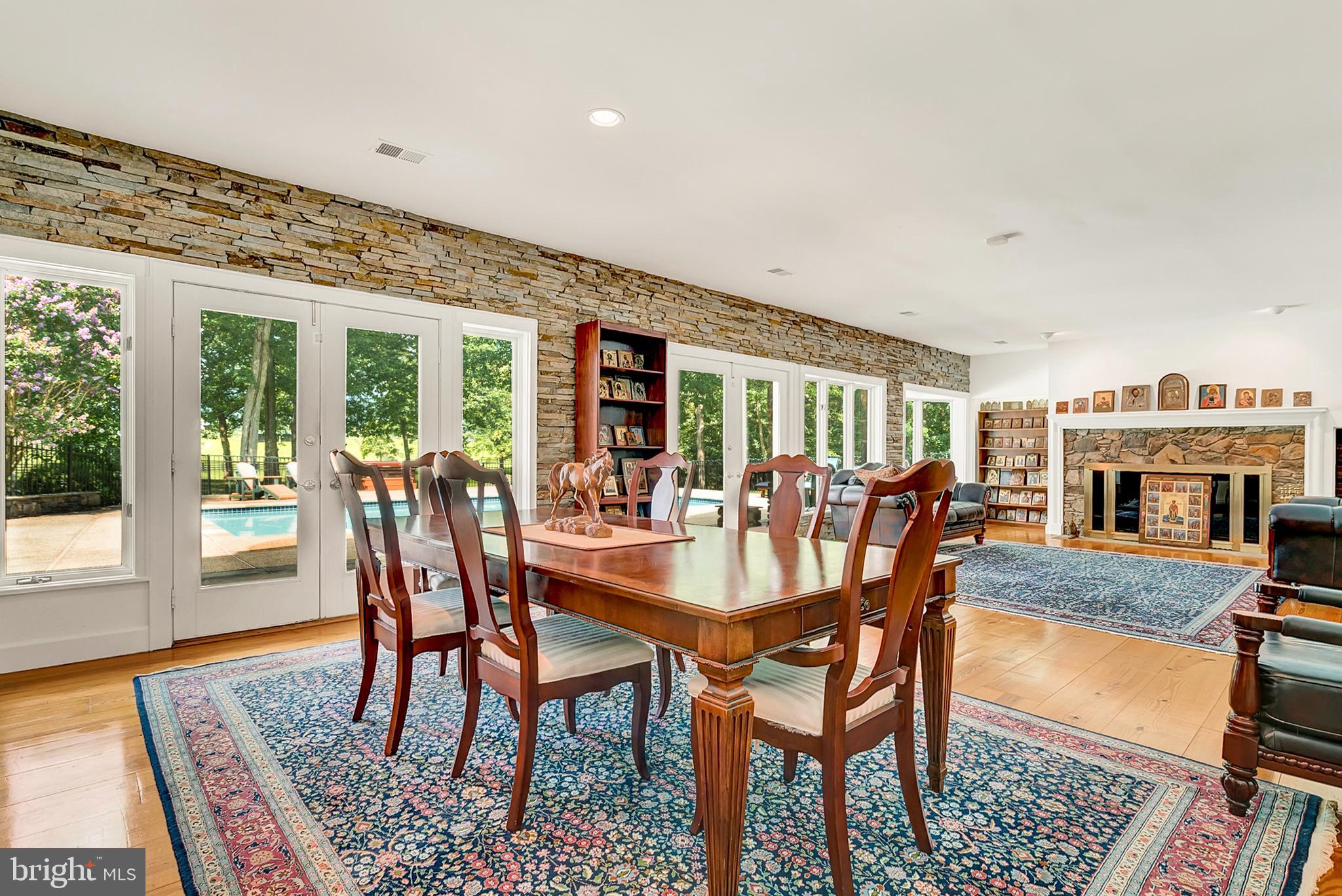20022 Trappe Road Bluemont, VA 20135 - Photo 23 of 97 a view of a dining room with furniture window and wooden floor