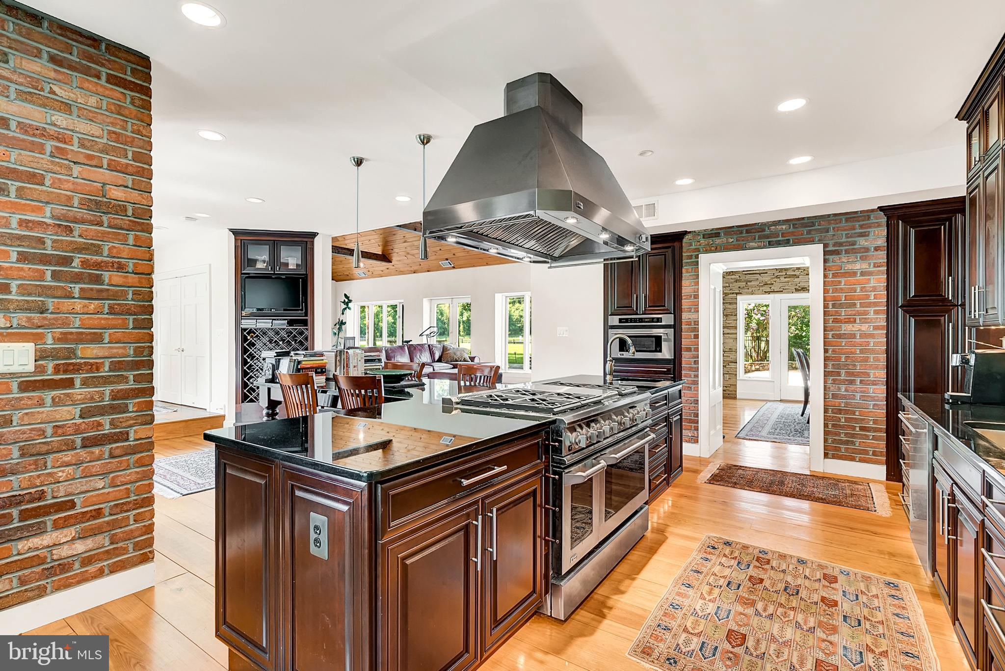 20022 Trappe Road Bluemont, VA 20135 - Photo 26 of 97 a kitchen with stainless steel appliances granite countertop a sink stove and cabinets