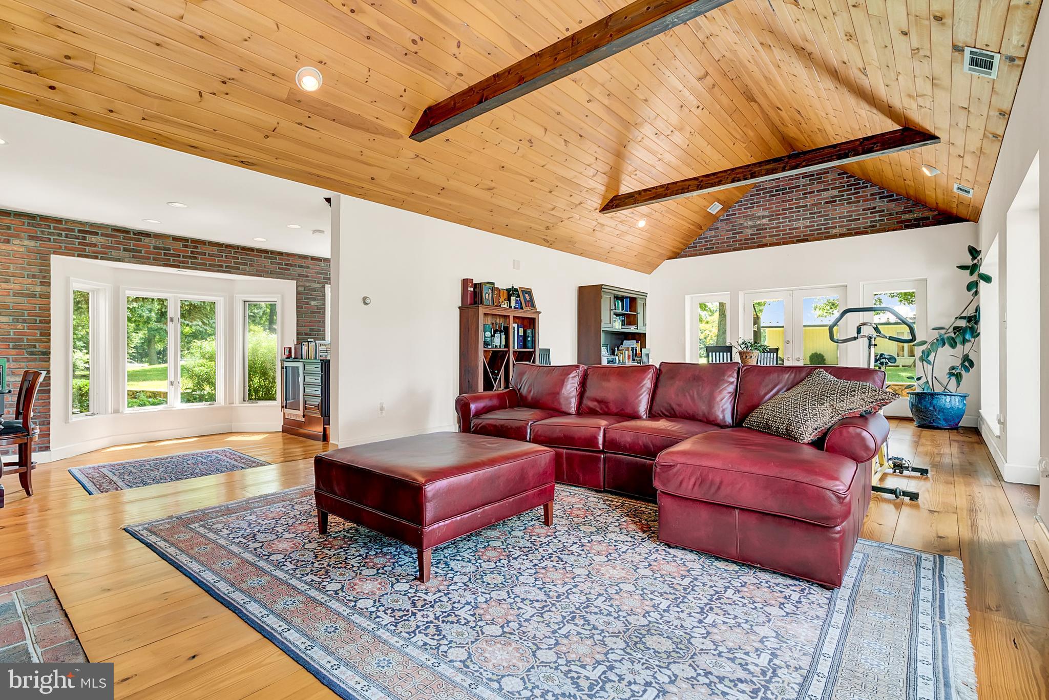 20022 Trappe Road Bluemont, VA 20135 - Photo 30 of 97 a living room with lots of furniture and a rug