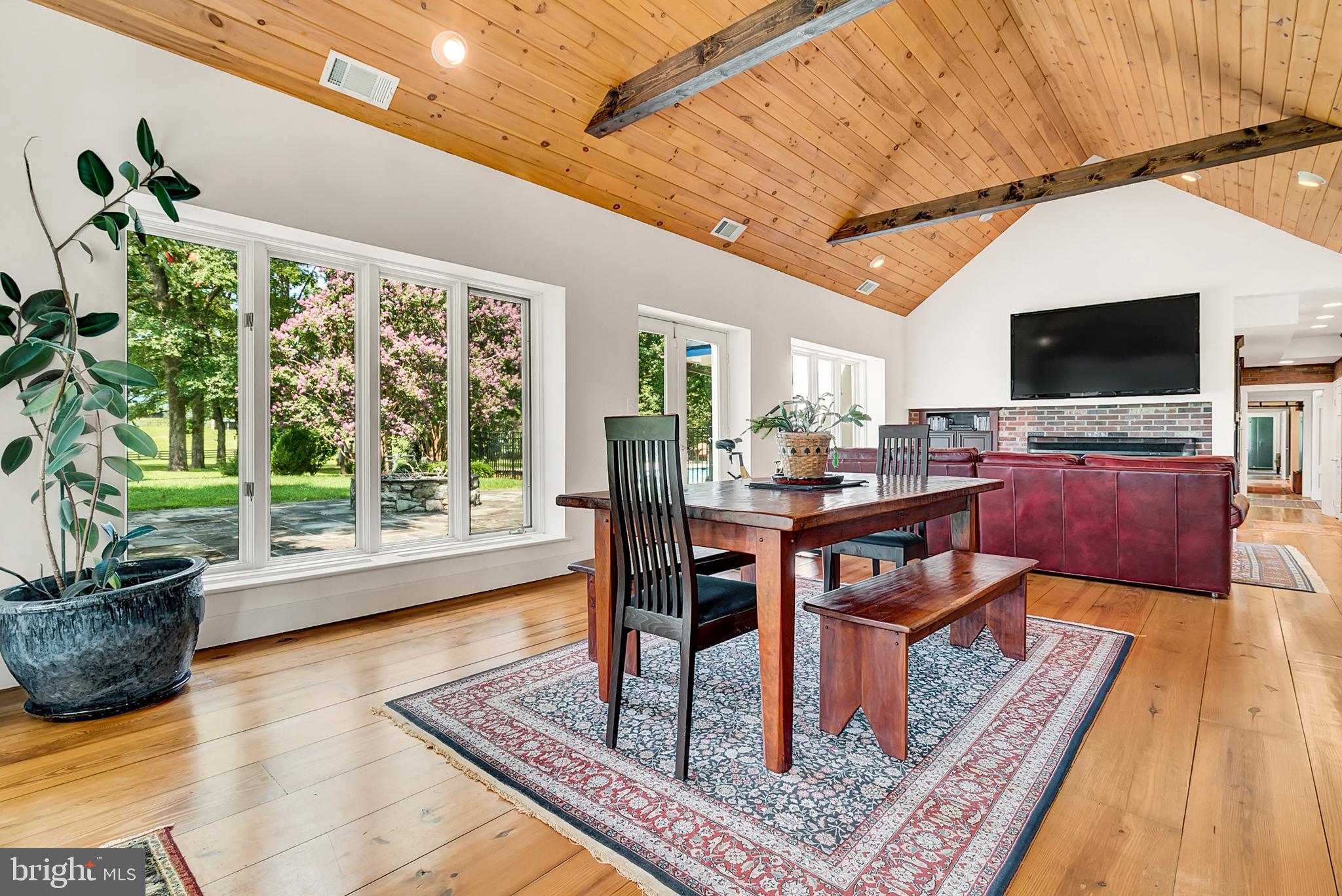 20022 Trappe Road Bluemont, VA 20135 - Photo 31 of 97 a living room with furniture and a flat screen tv