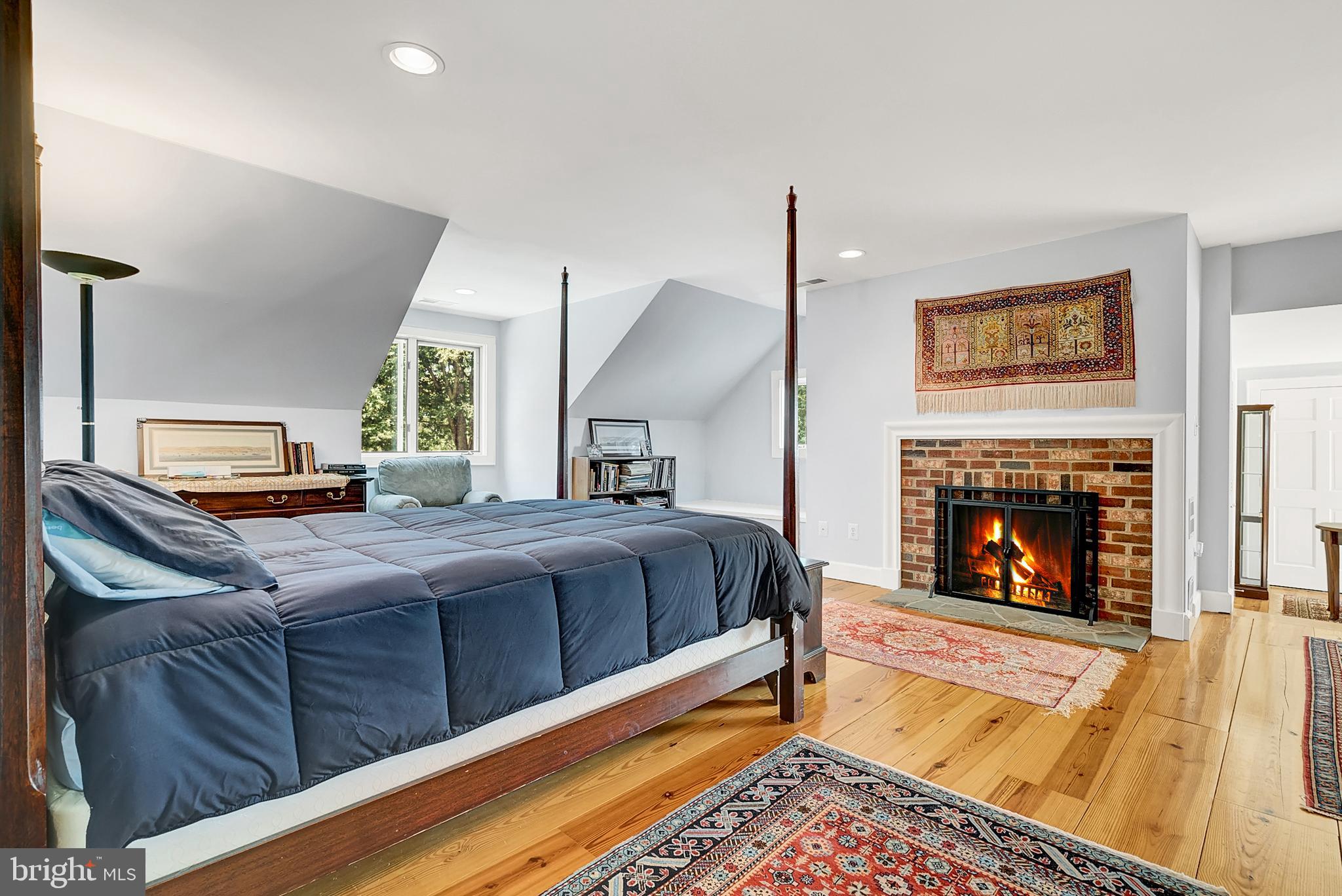 20022 Trappe Road Bluemont, VA 20135 - Photo 46 of 97 a bedroom with a bed and a fireplace