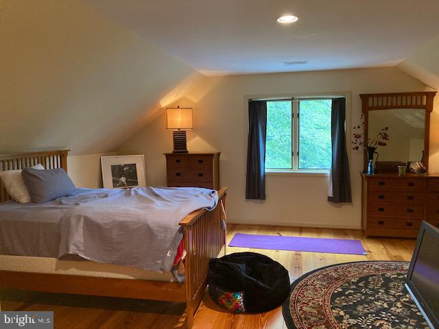 20022 Trappe Road Bluemont, VA 20135 - Photo 56 of 97 a bedroom with a bed and dresser with mirror