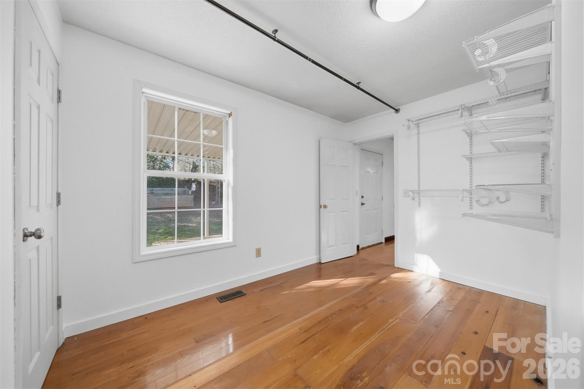 4771 Petra Mill Road Granite Falls, NC 28630 - Photo 27 of 46 an empty room with windows