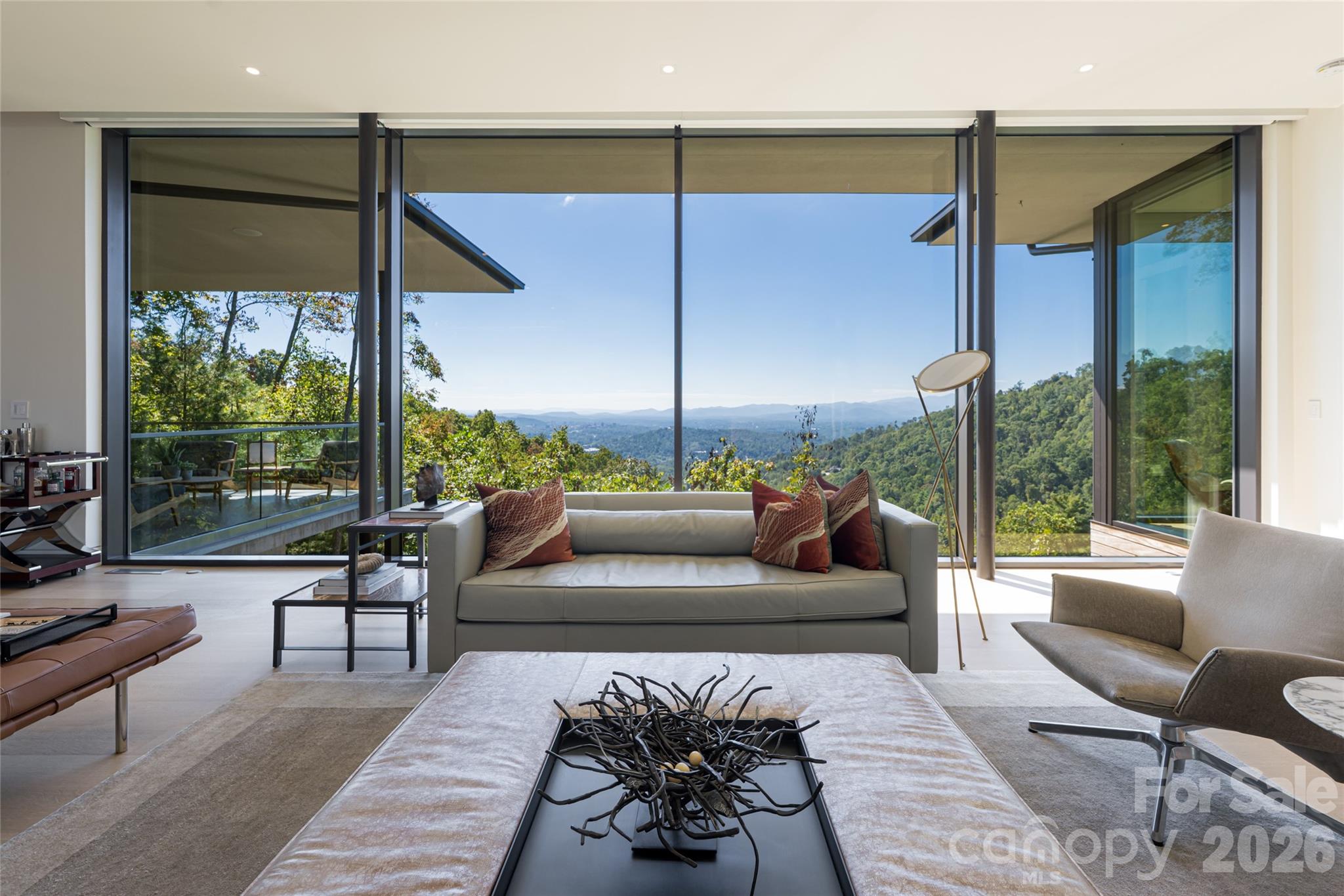 353 Retreat Ridge Way Asheville, NC 28804 - Photo 13 of 48 a living room with furniture and a large window