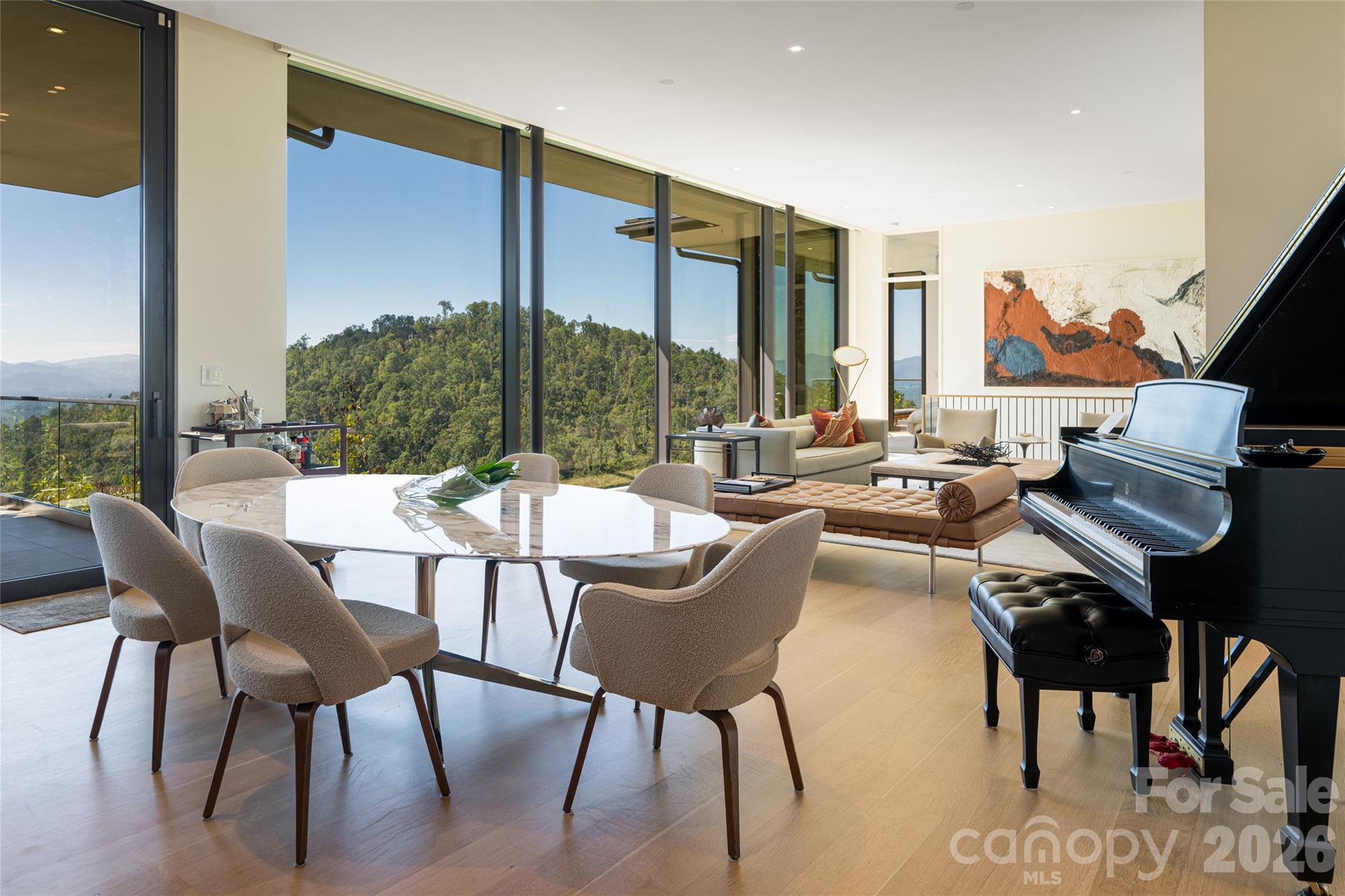 353 Retreat Ridge Way Asheville, NC 28804 - Photo 19 of 48 a view of a chairs and table in a patio