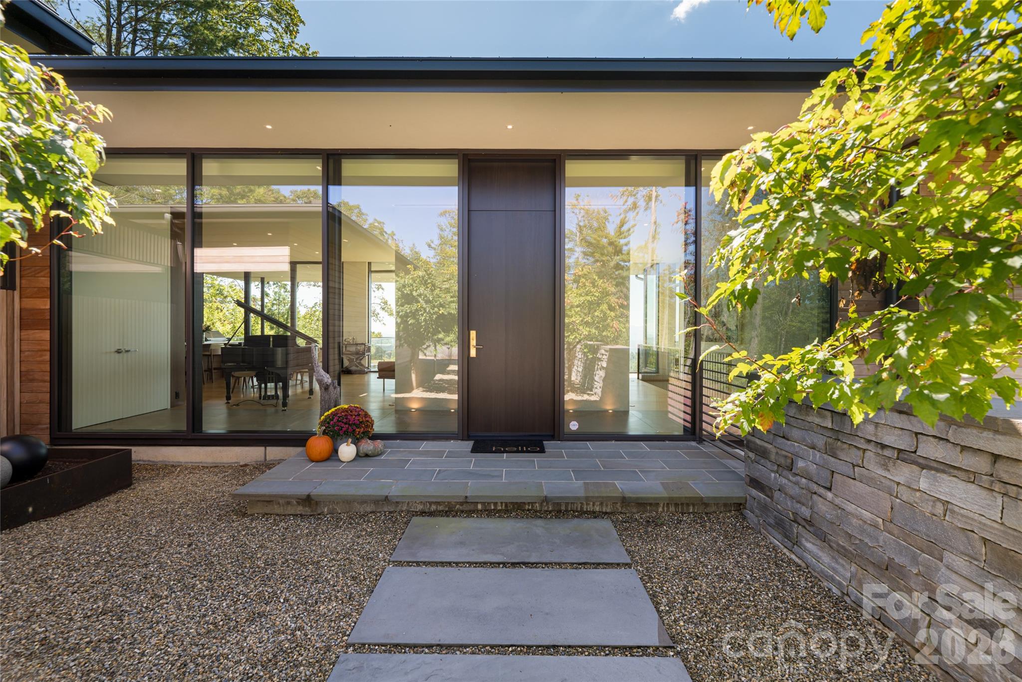 353 Retreat Ridge Way Asheville, NC 28804 - Photo 2 of 48 a view of a house with a porch