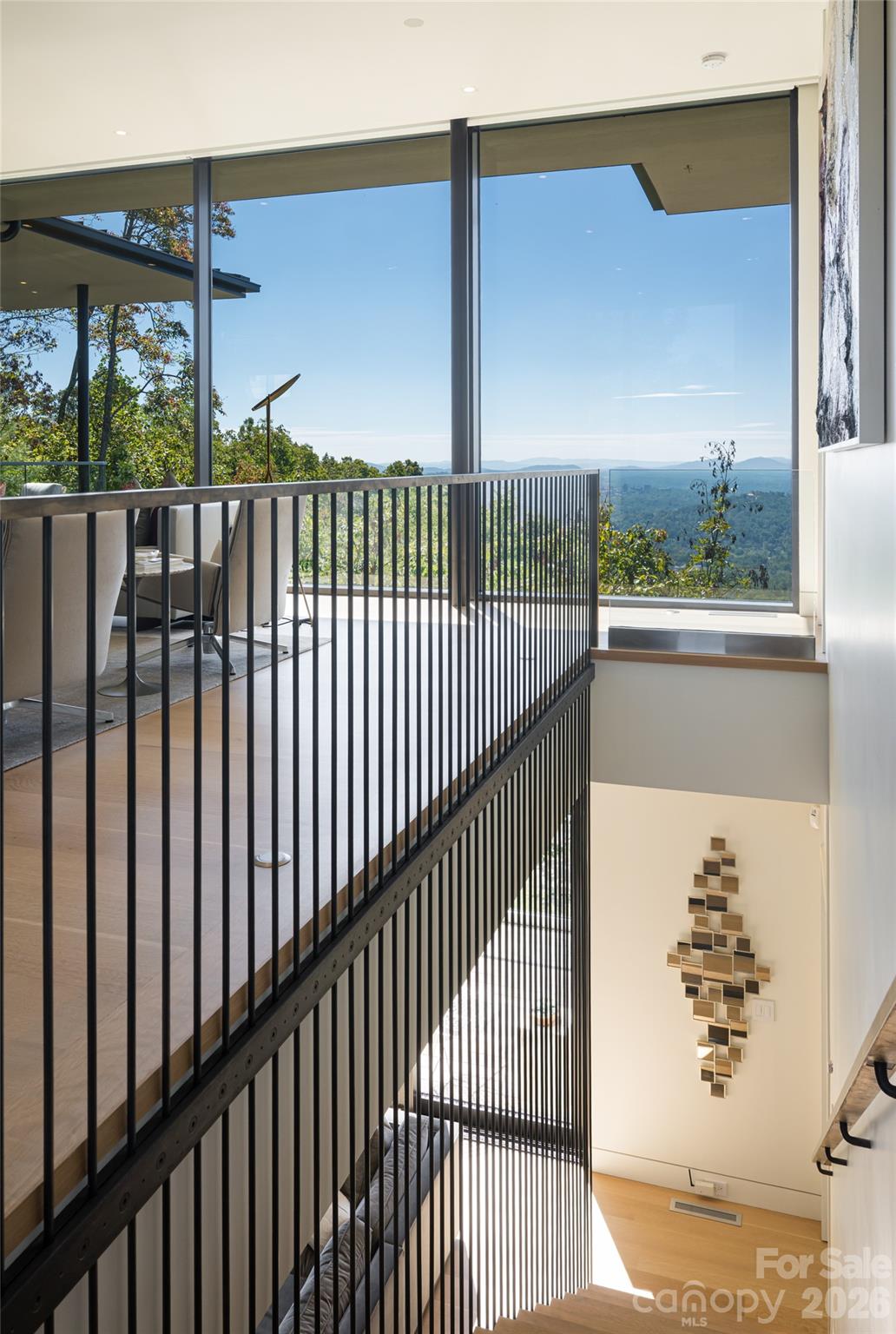 353 Retreat Ridge Way Asheville, NC 28804 - Photo 21 of 48 a view of a balcony with a tree