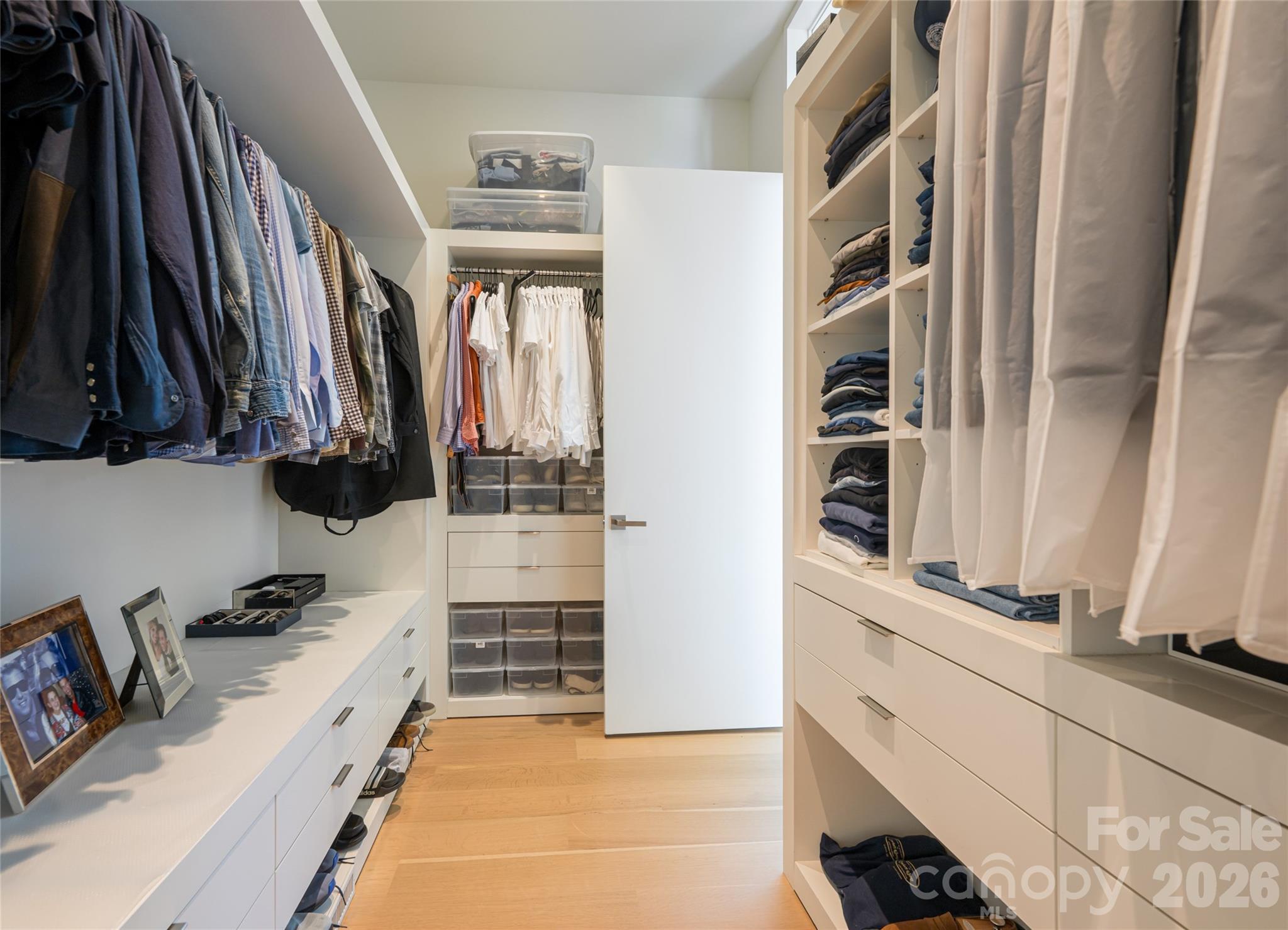 353 Retreat Ridge Way Asheville, NC 28804 - Photo 29 of 48 a view of walk in closet with clothes and shoes