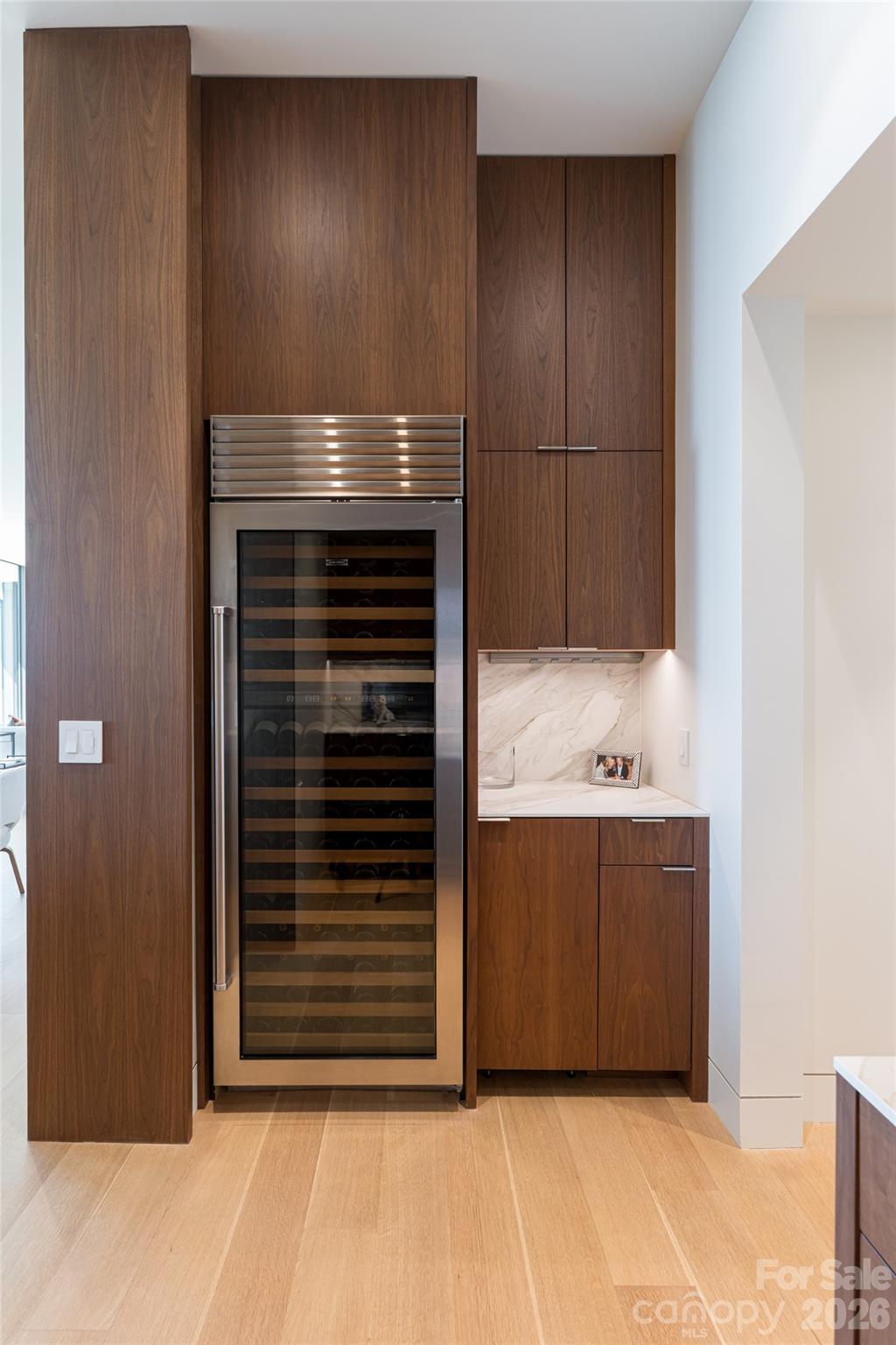 353 Retreat Ridge Way Asheville, NC 28804 - Photo 31 of 48 a kitchen with granite countertop white cabinets and stainless steel appliances