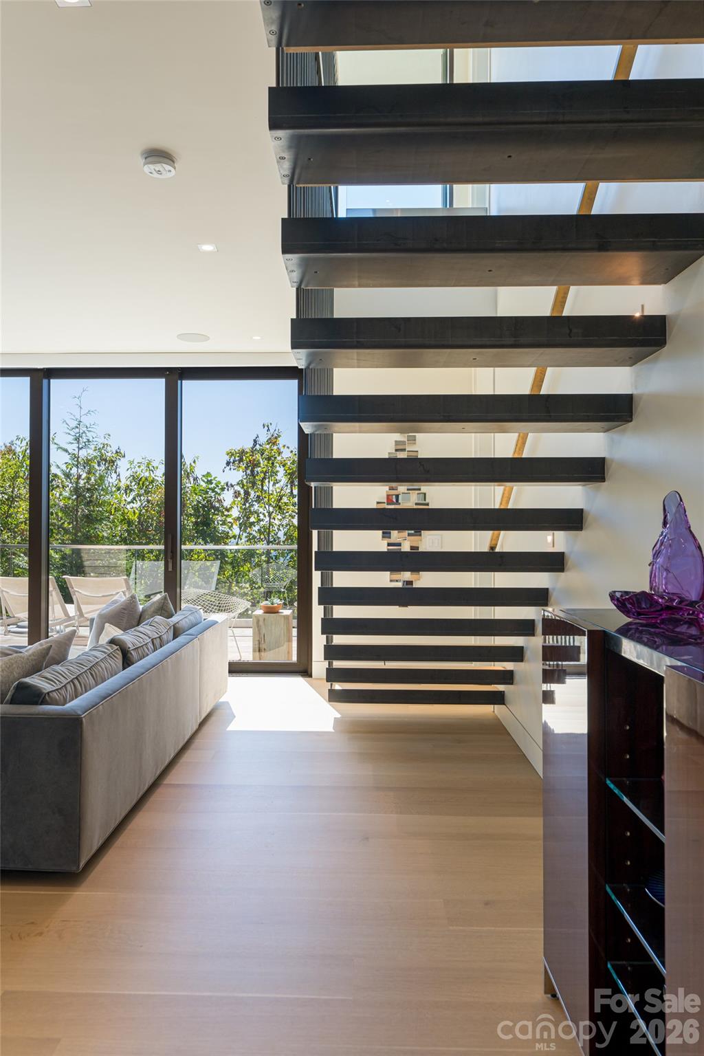 353 Retreat Ridge Way Asheville, NC 28804 - Photo 37 of 48 a view of a room with furniture and a large window