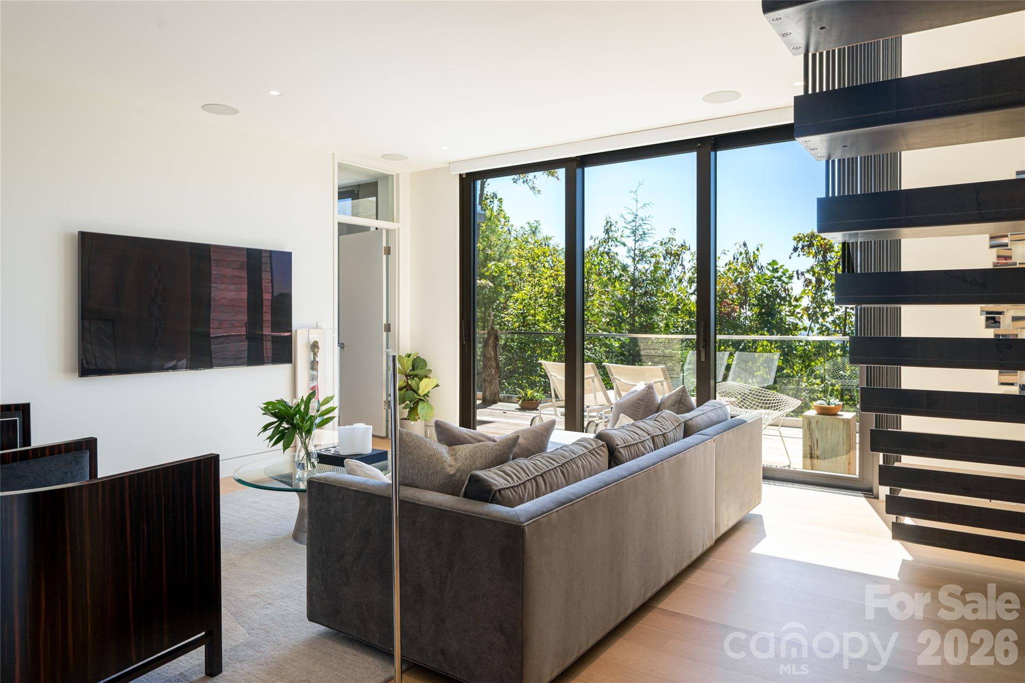 353 Retreat Ridge Way Asheville, NC 28804 - Photo 38 of 48 a living room with furniture and a flat screen tv
