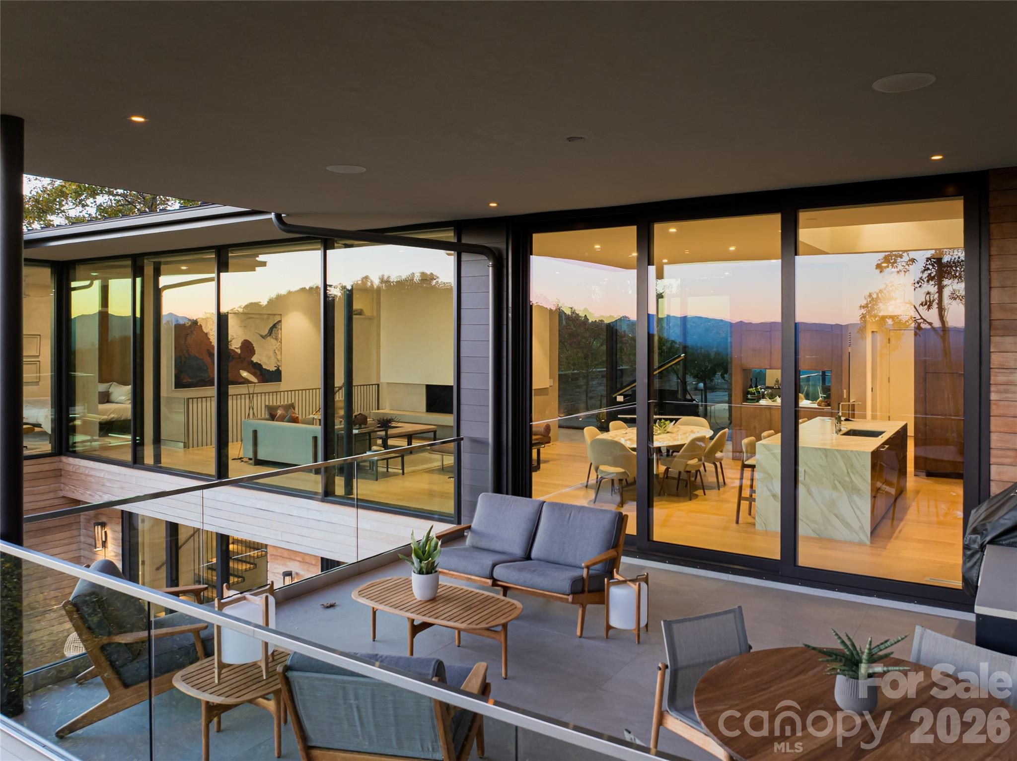 353 Retreat Ridge Way Asheville, NC 28804 - Photo 43 of 48 a room with furniture and large windows