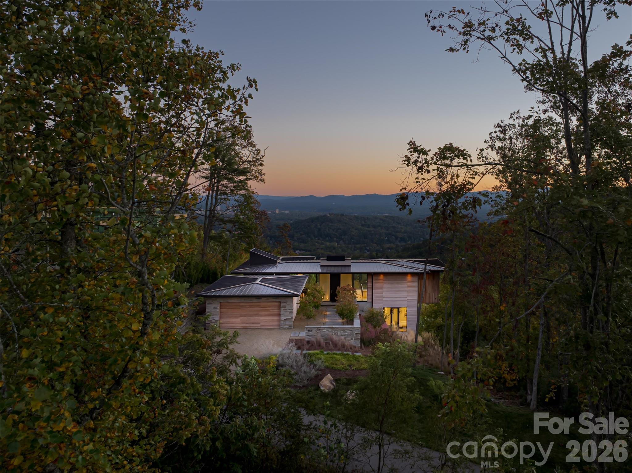353 Retreat Ridge Way Asheville, NC 28804 - Photo 48 of 48 a view of a house with a yard