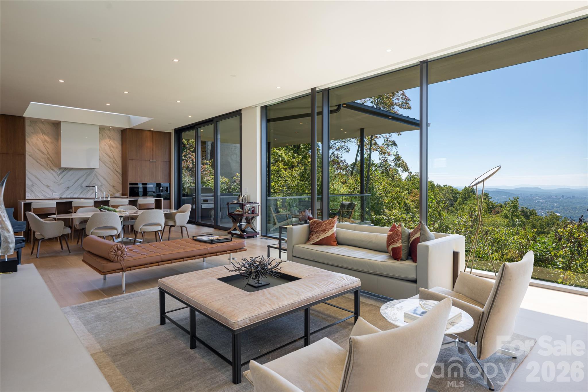 353 Retreat Ridge Way Asheville, NC 28804 - Photo 6 of 48 a living room with furniture a table and a large window