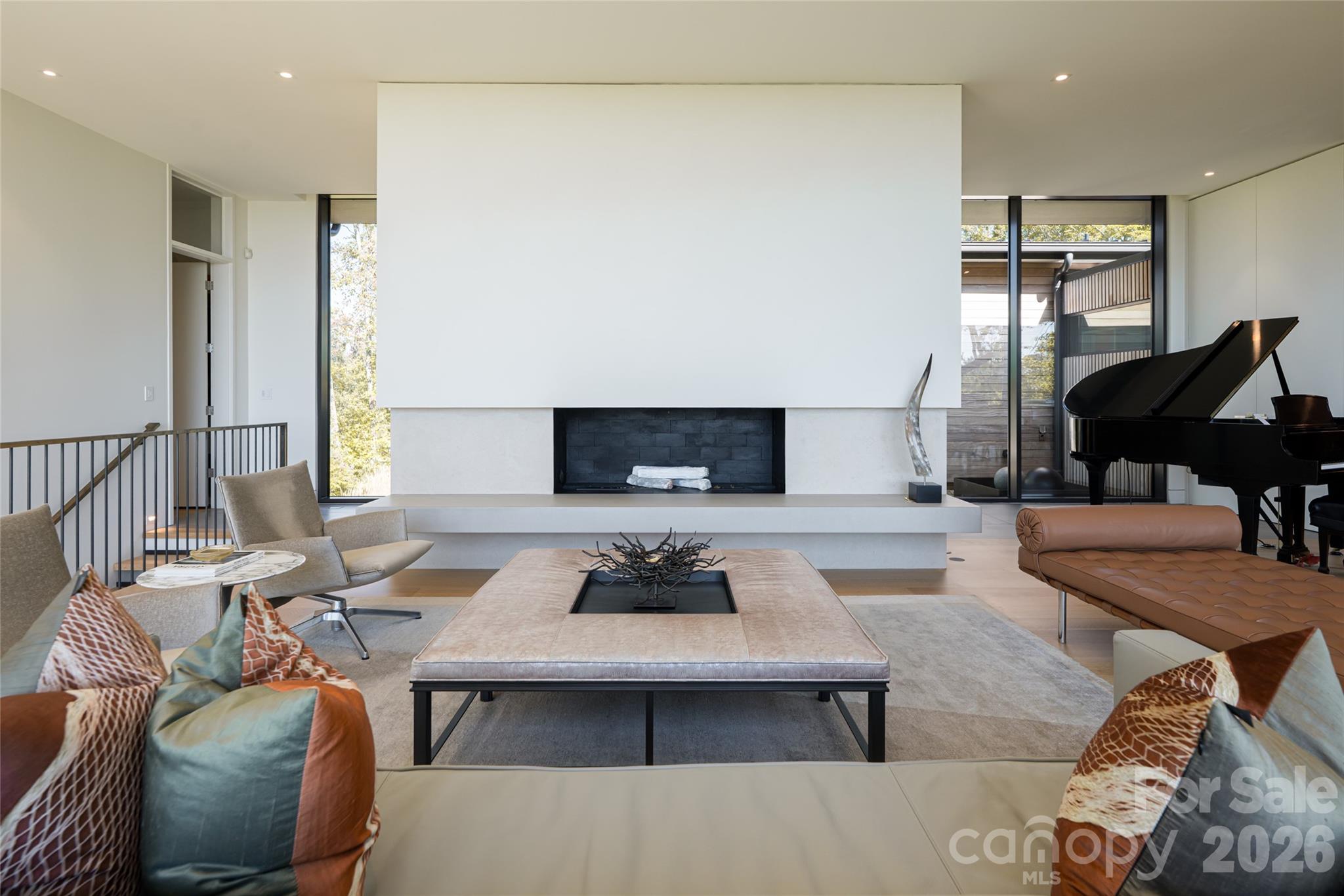 353 Retreat Ridge Way Asheville, NC 28804 - Photo 9 of 48 a living room with furniture and a rug