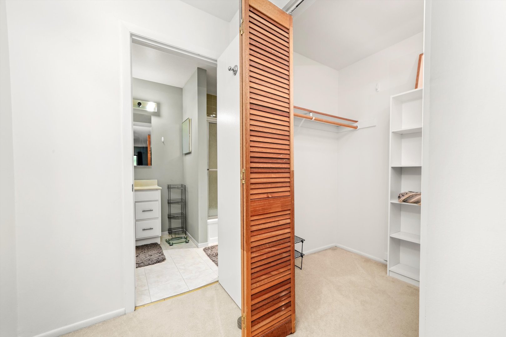 1926 Prairie Square, Unit 210B Schaumburg, IL 60173 - Photo 11 of 20 a view of a bedroom with closet