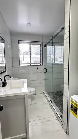 a bathroom with a sink and a bathtub