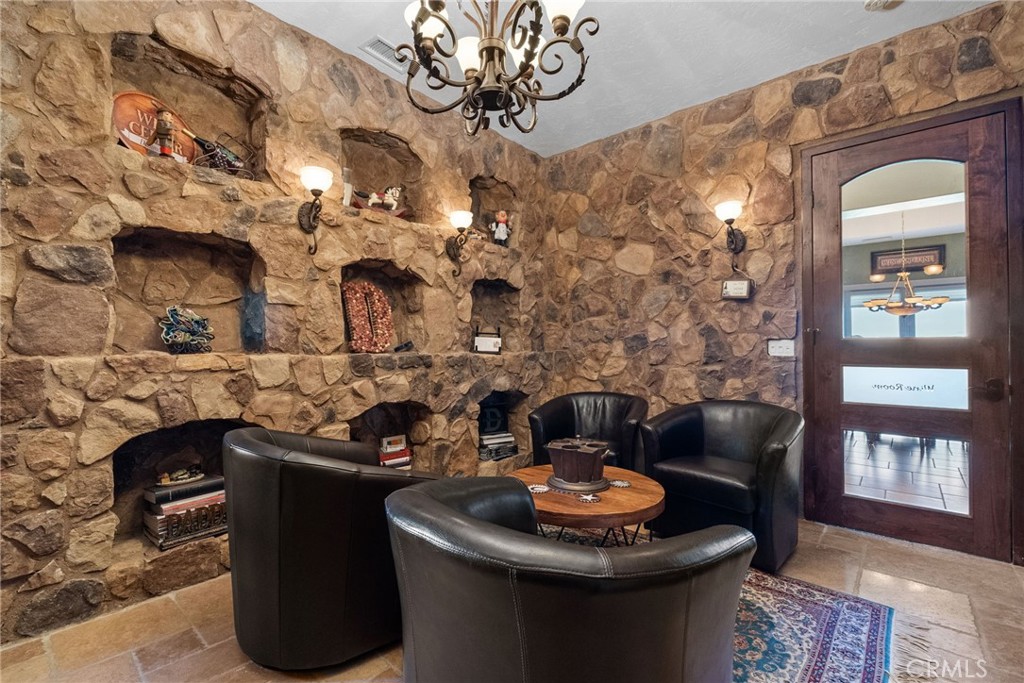 35394 Linda Rosea Road Temecula, CA 92592 - Photo 15 of 69 a living room with fireplace furniture and a fireplace