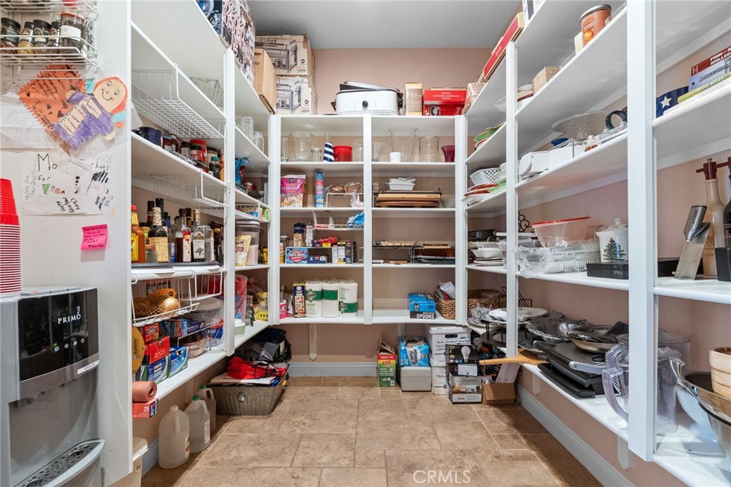 35394 Linda Rosea Road Temecula, CA 92592 - Photo 26 of 69 a room with storage and a white cabinets