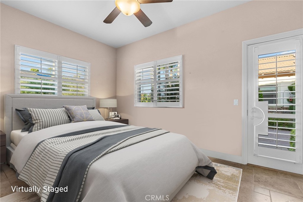 35394 Linda Rosea Road Temecula, CA 92592 - Photo 29 of 69 a spacious bedroom with a bed and a window