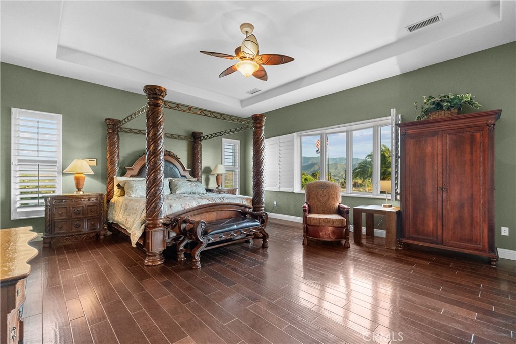 35394 Linda Rosea Road Temecula, CA 92592 - Photo 32 of 69 a living room with furniture and a wooden floor