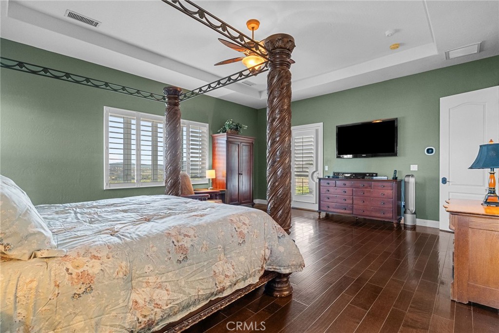 35394 Linda Rosea Road Temecula, CA 92592 - Photo 34 of 69 a bedroom with a bed and a flat screen tv