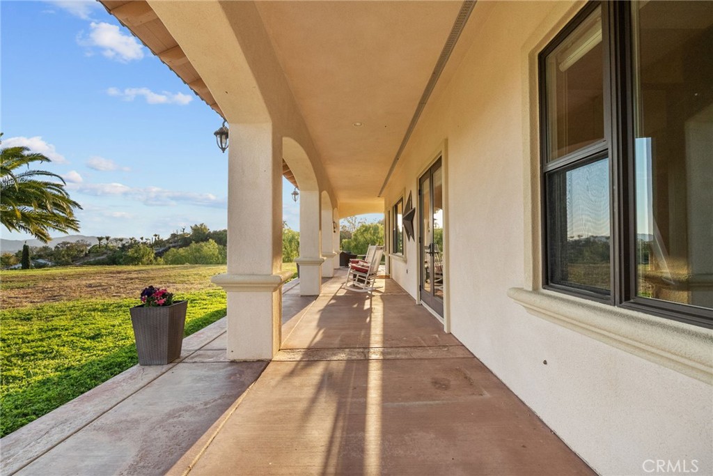 35394 Linda Rosea Road Temecula, CA 92592 - Photo 49 of 69 a view of a balcony with lake view and a potted plant