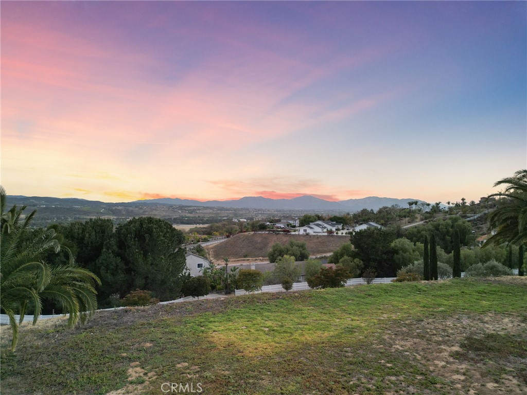 35394 Linda Rosea Road Temecula, CA 92592 - Photo 61 of 69 a view of a grassy area with mountains and a mountain view