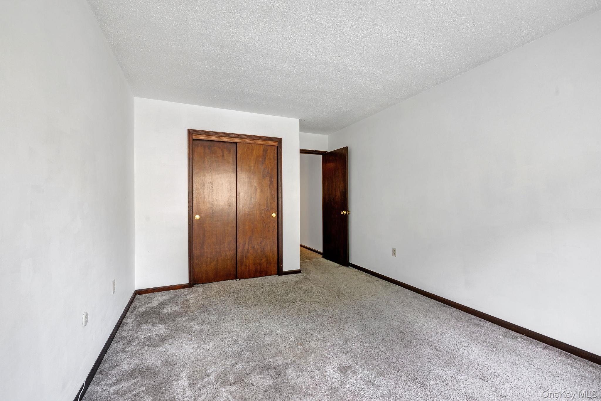 9 Spruce Court Fishkill, NY 12524 - Photo 16 of 33 a view of an empty room