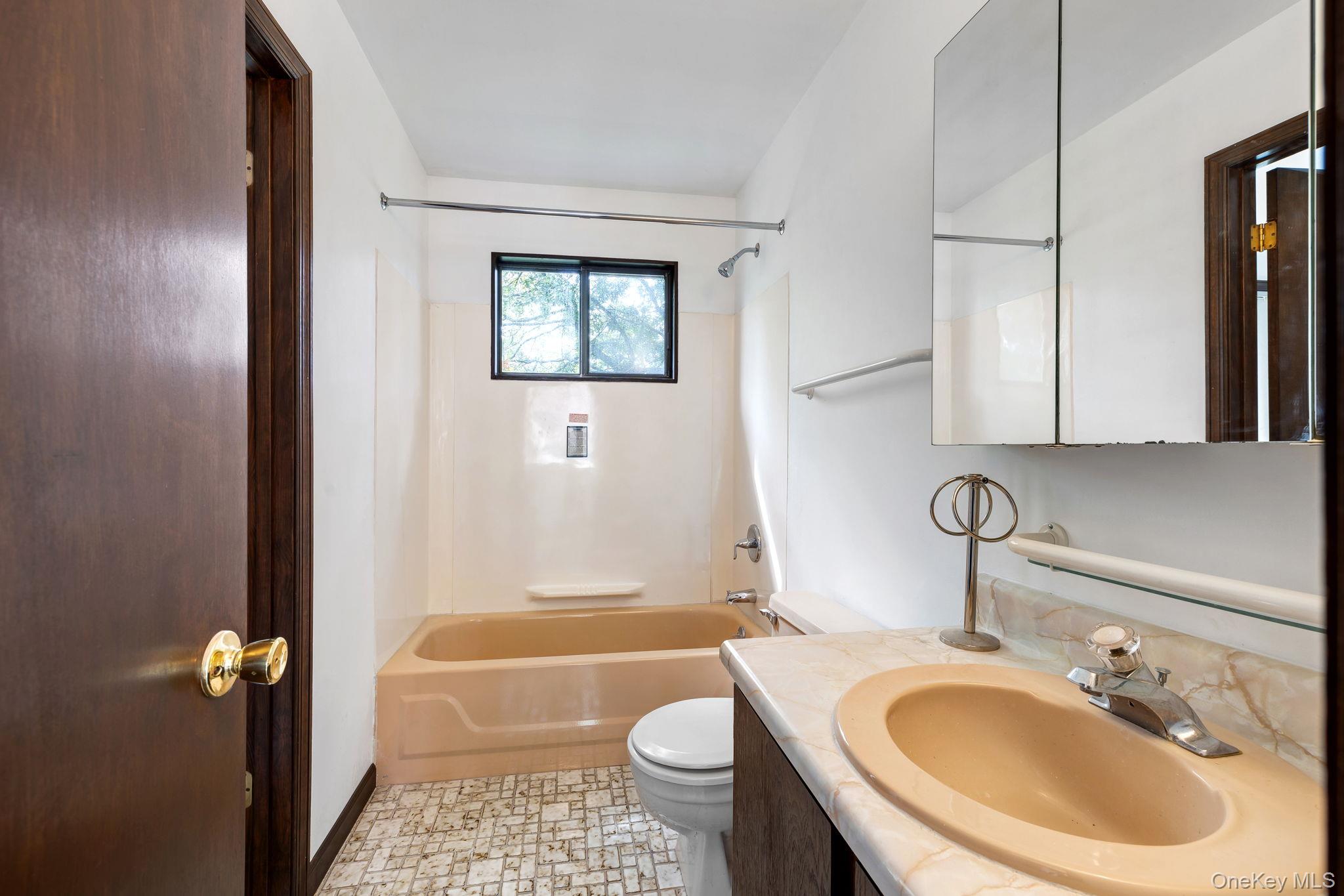 9 Spruce Court Fishkill, NY 12524 - Photo 17 of 33 a bathroom with a sink toilet and shower