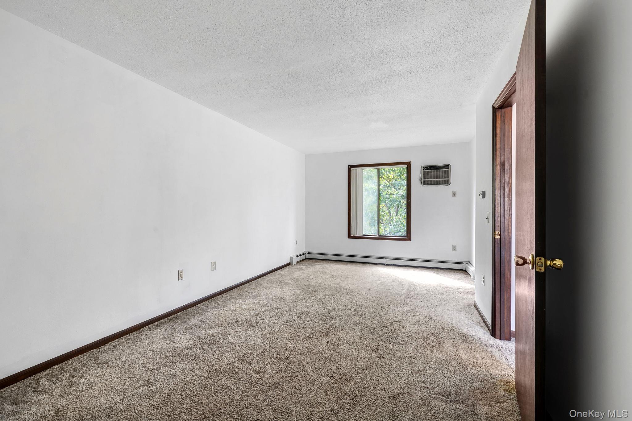 9 Spruce Court Fishkill, NY 12524 - Photo 20 of 33 an empty room with windows