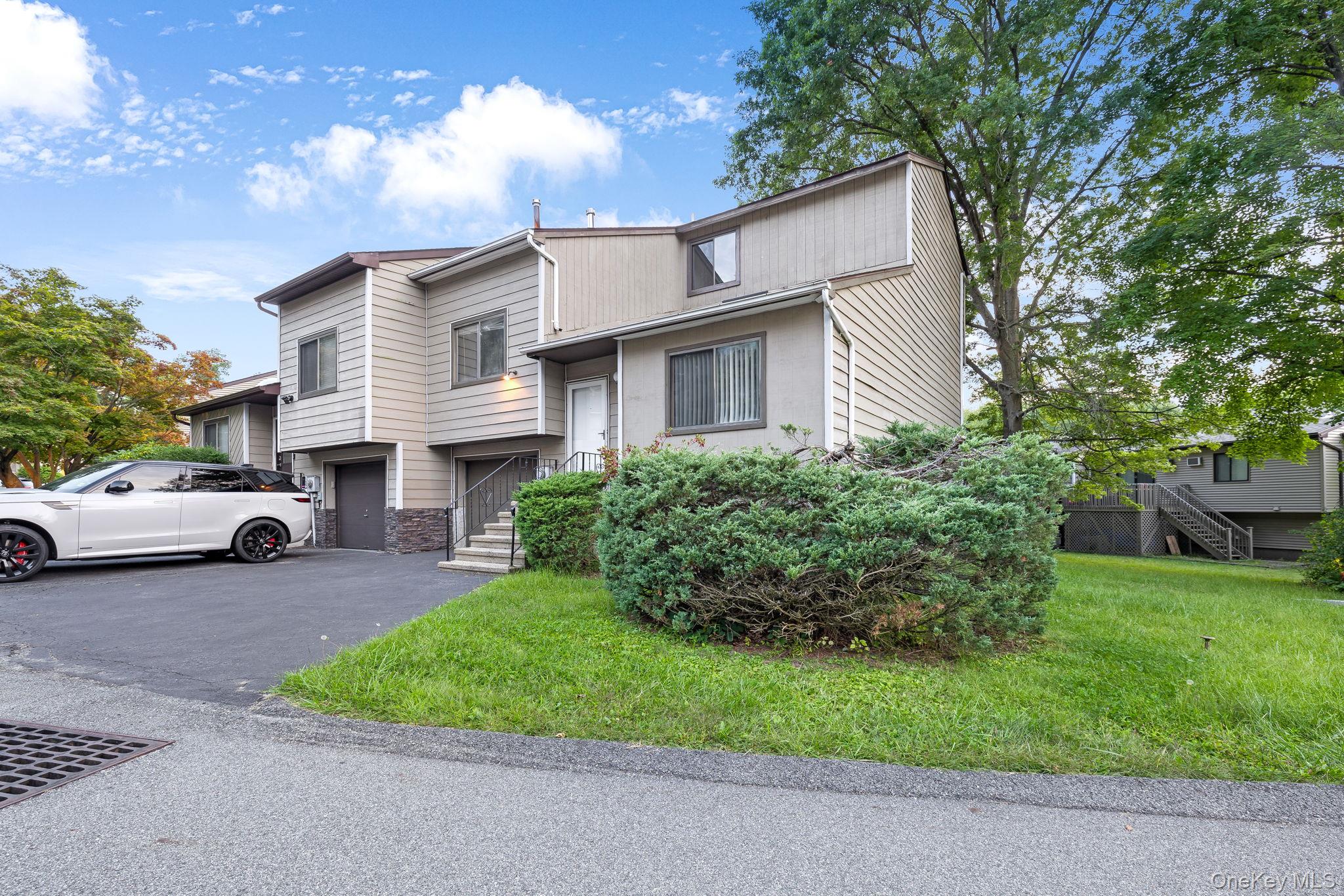 9 Spruce Court Fishkill, NY 12524 - Photo 2 of 33 a view of a house with a garden