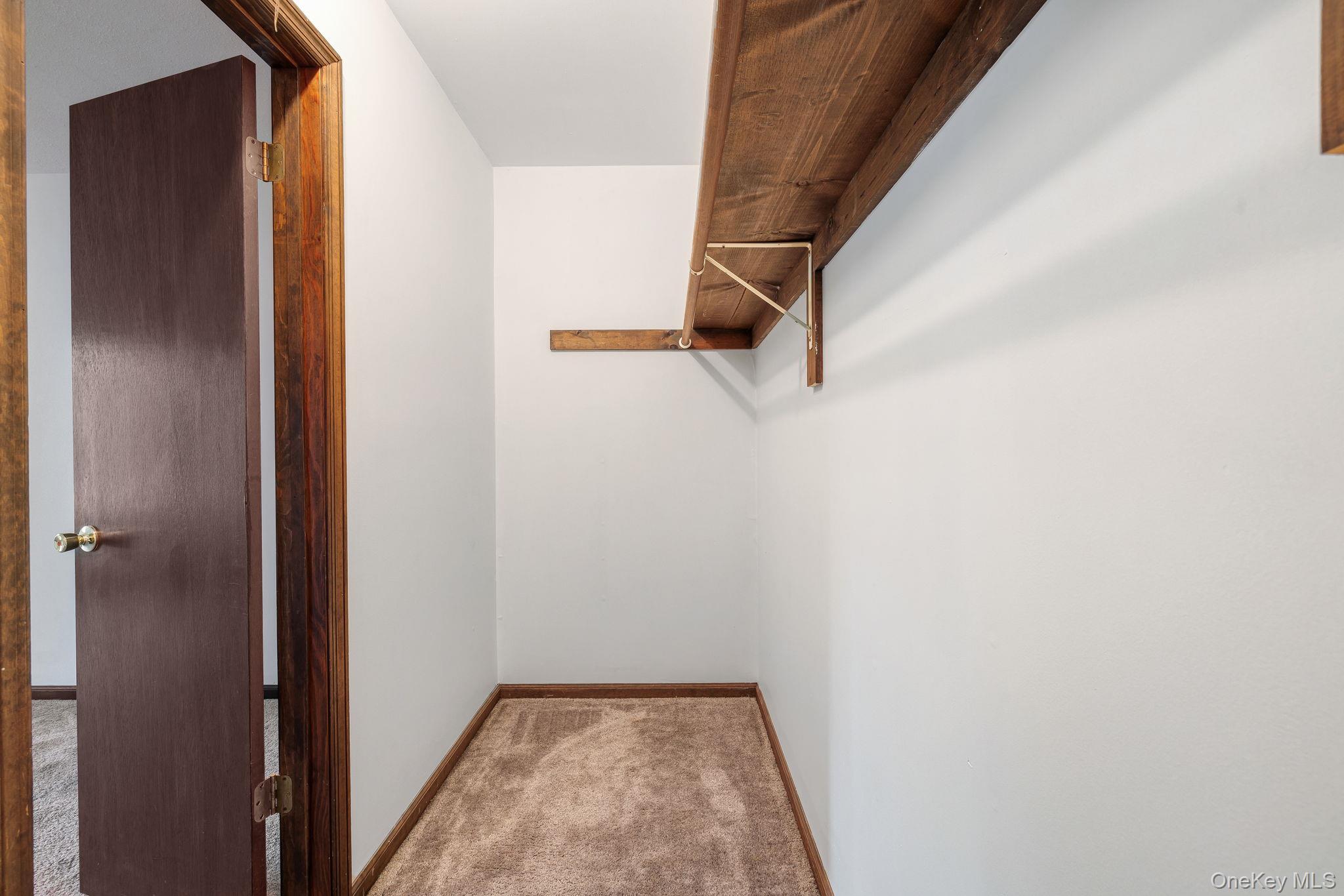9 Spruce Court Fishkill, NY 12524 - Photo 22 of 33 a view of hallway with stairs