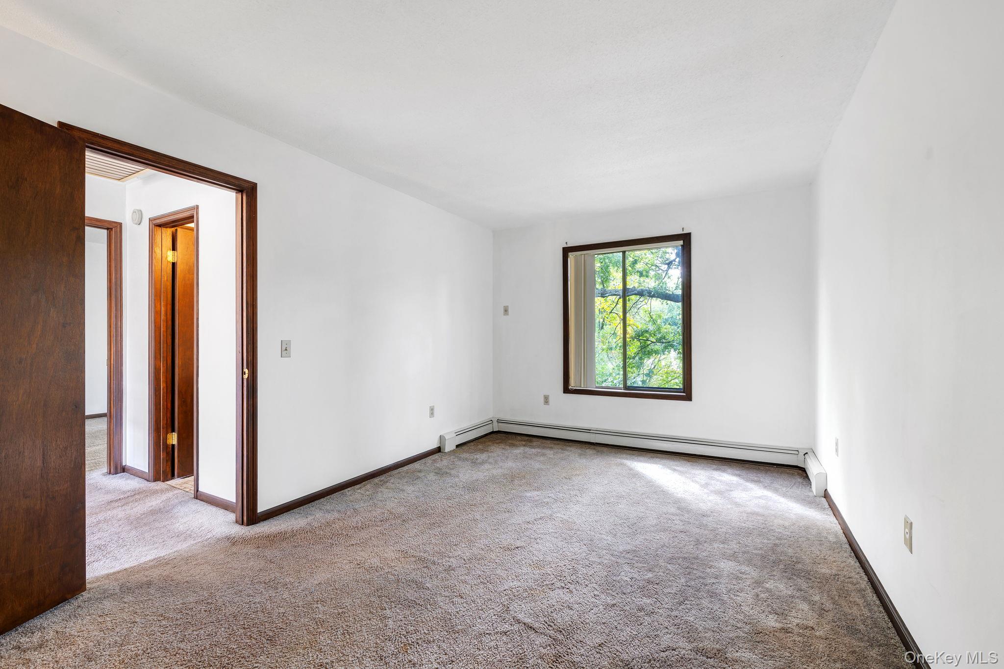 9 Spruce Court Fishkill, NY 12524 - Photo 23 of 33 an empty room with windows