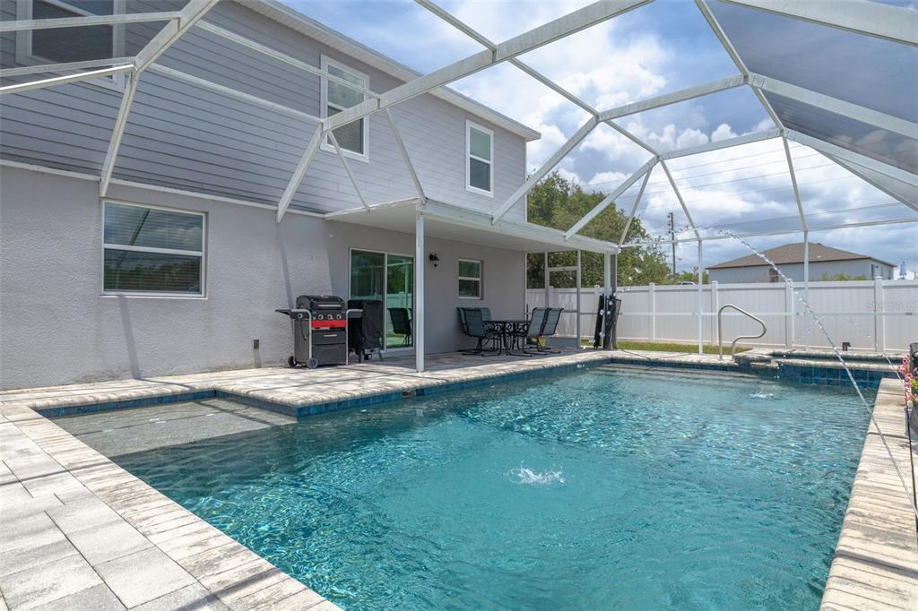 7242 Landmark Drive Spring Hill, FL 34606 - Photo 19 of 45 a view of a backyard of the house