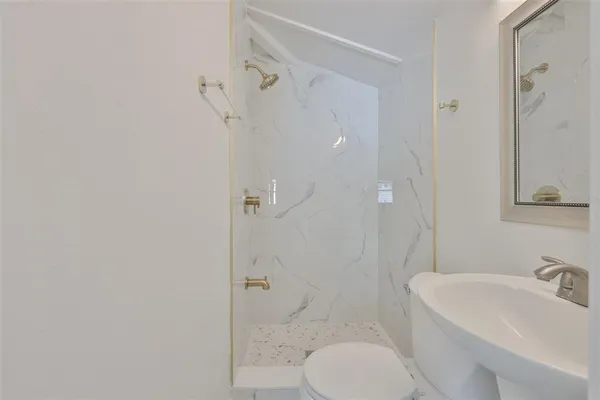 a view of an empty room with closet