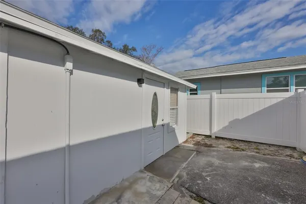 an aerial view of a house with a garden