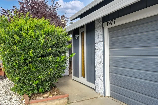 a yellow house with outdoor space