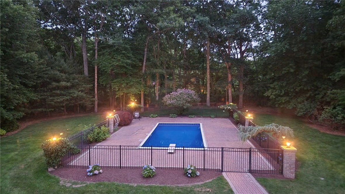 680 Fletcher Road North Kingstown, RI 02852 - Photo 5 of 41 Pool at dusk with lights and so much privacy!