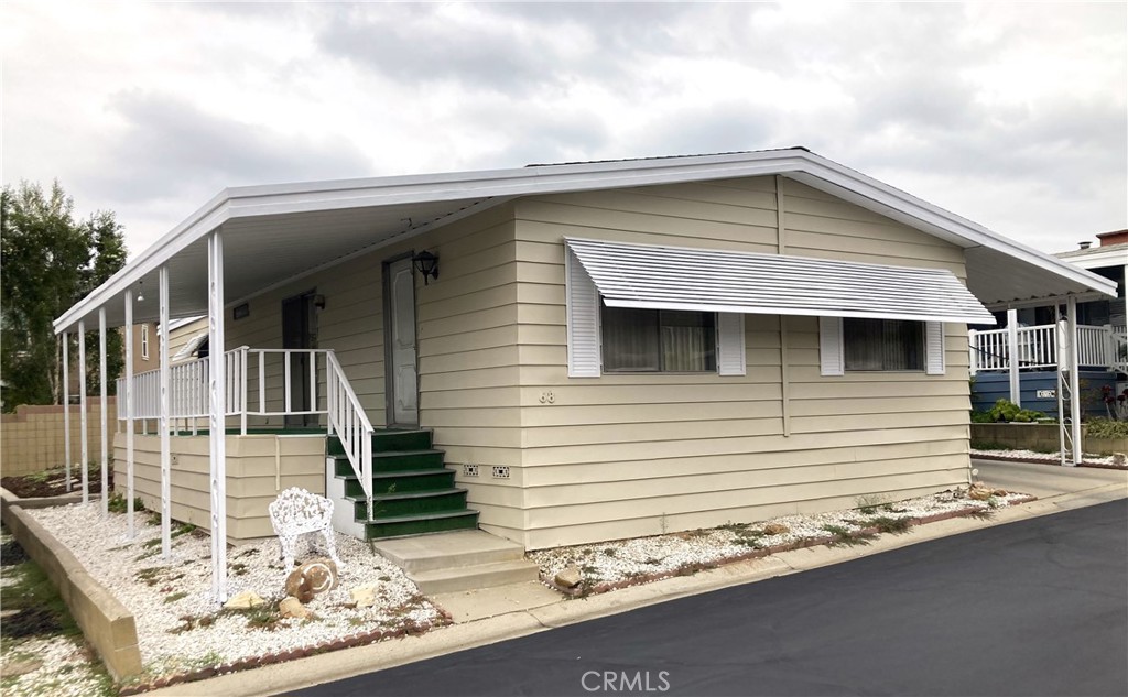 a front view of a house with garage