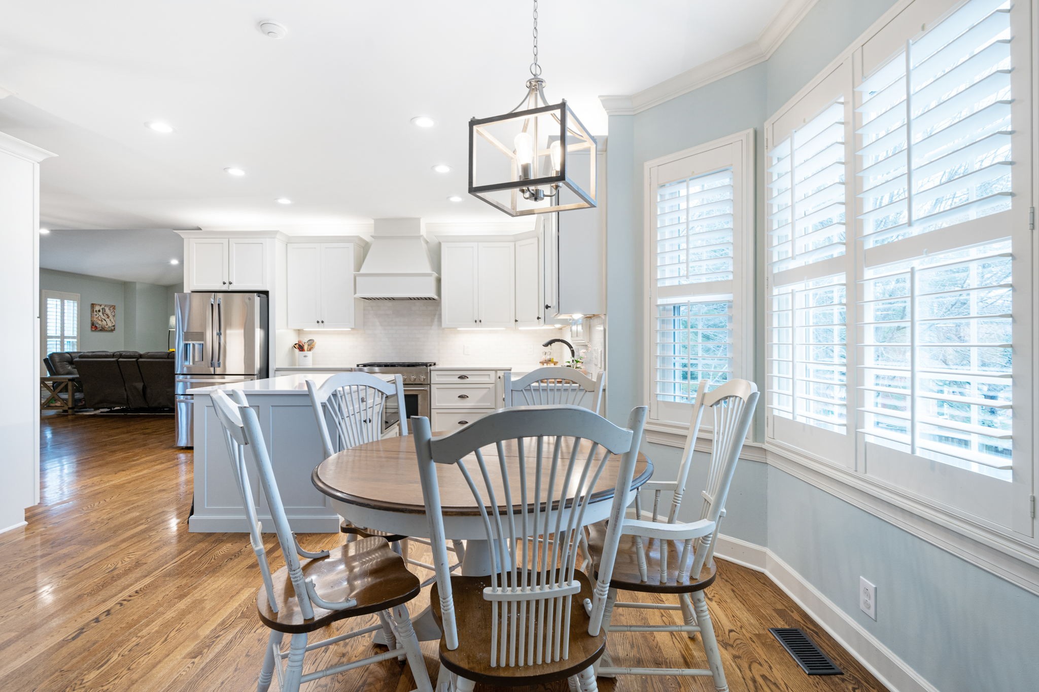 910 Riverbend Road Nashville, TN 37221 - Photo 14 of 48 a view of a dining room with furniture window and wooden floor