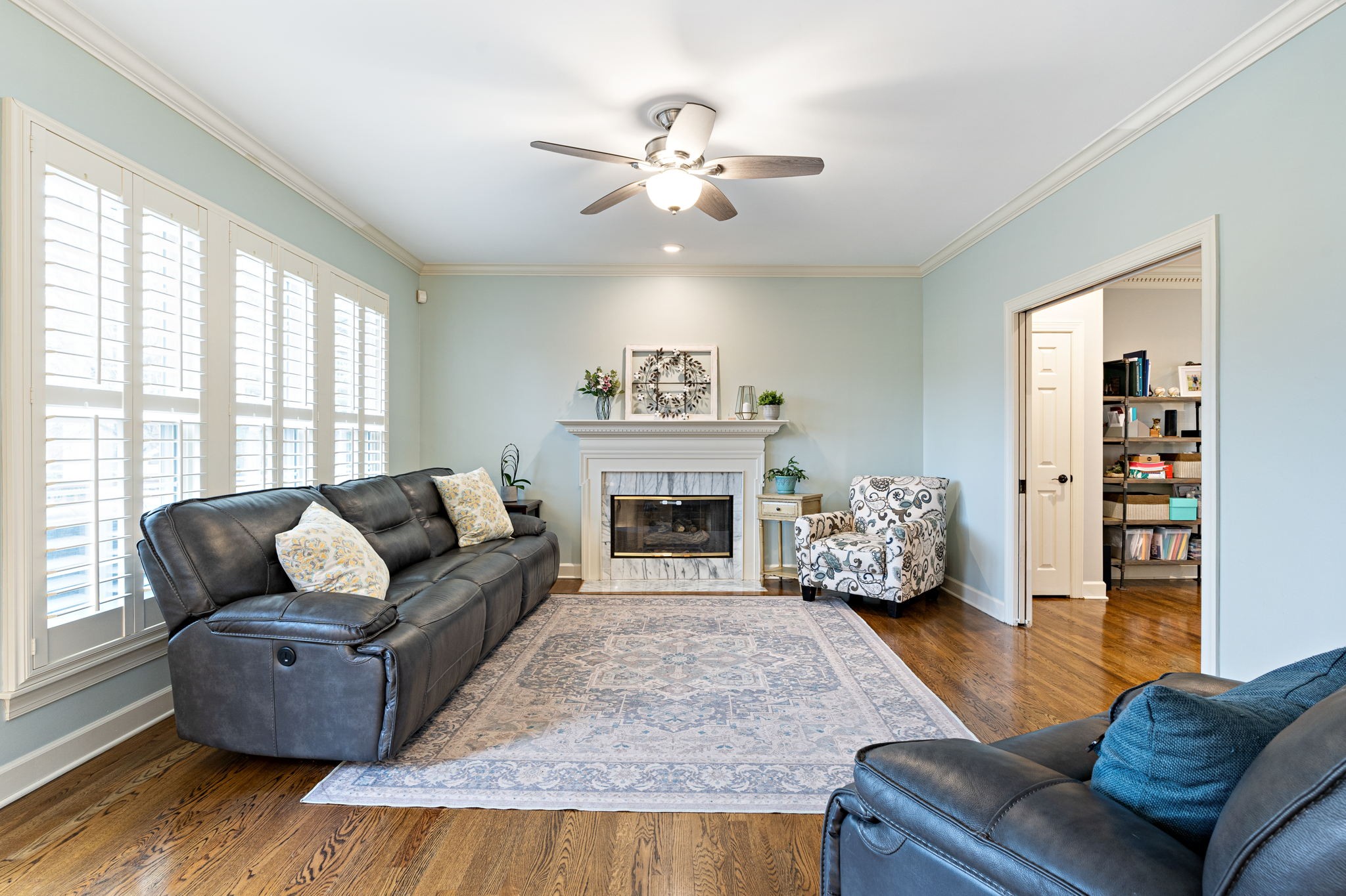 910 Riverbend Road Nashville, TN 37221 - Photo 15 of 48 a living room with furniture and a fireplace