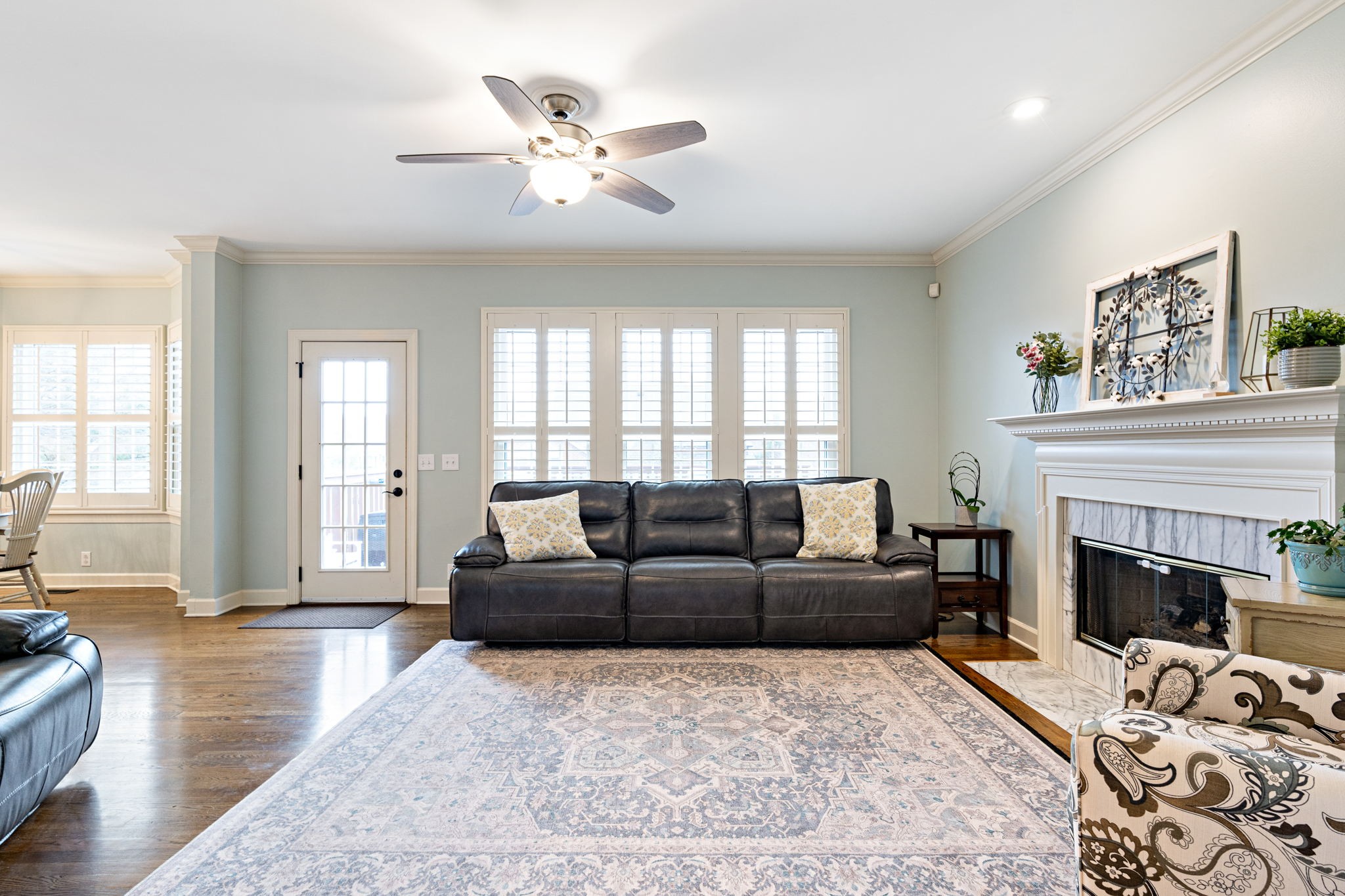 910 Riverbend Road Nashville, TN 37221 - Photo 16 of 48 a living room with furniture and a fireplace